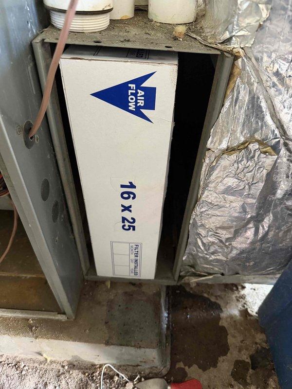 Completed installation of a 4-ton, 15.5 SEER upflow air conditioning system with zoning capabilities. The new AC unit was integrated with the existing Rheem Classic 90 Plus furnace in the basement mechanical space, with proper refrigerant line connections, electrical wiring, condensate drainage via PVC piping, and insulated ductwork configuration to support the multi-zone climate control system.