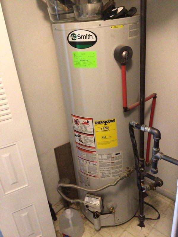 Completed complimentary HVAC system maintenance tune-up as requested. Performed standard preventive maintenance procedures on the heating and cooling system, inspected the 16x20x4 UMC filter box assembly, and documented equipment conditions including the A.O. Smith water heater and associated mechanical components in the utility space.