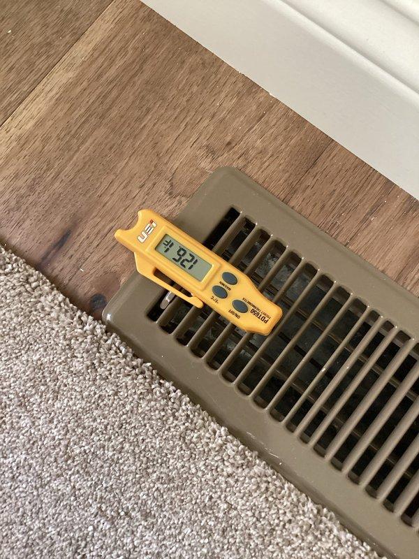 Conducted follow-up site visit to verify HVAC system performance after recent installation. Measured and documented supply air temperatures at multiple registers throughout the home, recording readings of 73.5°F at supply diffuser and verified proper airflow distribution at floor register locations. All measurements indicated system operating within normal parameters; no deficiencies identified or corrective action required.