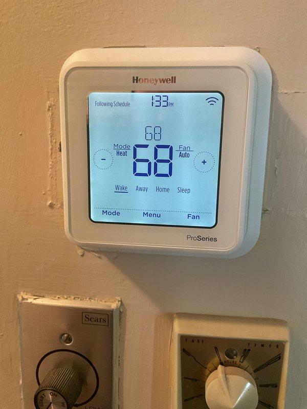Completed comprehensive HVAC system tune-up and maintenance inspection as part of scheduled preventative maintenance program. Verified thermostat operation and programming settings on Honeywell ProSeries digital unit, confirming proper temperature control and WiFi connectivity. Inspected air distribution system including floor registers and ductwork accessibility for optimal airflow throughout the residence.
