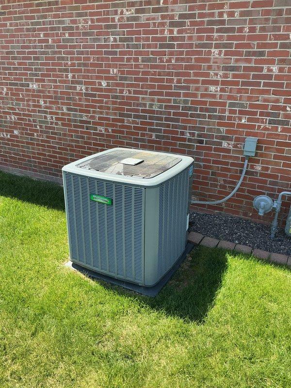 # HVAC Maintenance Summary

Completed Gold Level planned maintenance on a 7-year-old Carrier single-system residential HVAC unit during second visit for service renewal. Performed comprehensive system inspection of outdoor condenser unit and indoor Aspen refrigerant evaporator (Model CC42C44210R057, Serial G18-00009223) utilizing R-410A refrigerant with TXV installed. Verified proper operation of all components, checked electrical connections at disconnect box, and documented equipment condition through photographic records. System operating within normal parameters with no deficiencies noted.