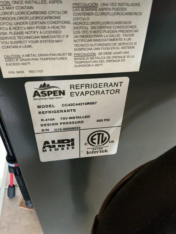 # HVAC Maintenance Summary

Completed Gold Level planned maintenance on a 7-year-old Carrier single-system residential HVAC unit during second visit for service renewal. Performed comprehensive system inspection of outdoor condenser unit and indoor Aspen refrigerant evaporator (Model CC42C44210R057, Serial G18-00009223) utilizing R-410A refrigerant with TXV installed. Verified proper operation of all components, checked electrical connections at disconnect box, and documented equipment condition through photographic records. System operating within normal parameters with no deficiencies noted.