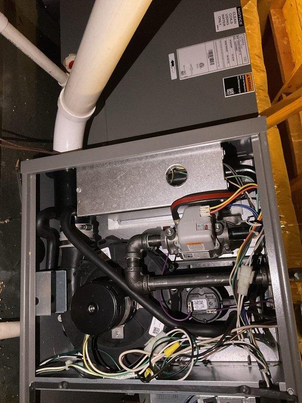 Completed scheduled HVAC maintenance tune-up on residential gas furnace system located in attic space. Performed comprehensive inspection of all internal components including heat exchanger, burner assembly, blower motor, electrical control board, and associated wiring connections. Verified proper operation of gas supply lines, condensate drain system, and safety controls. System found to be in normal operational condition with all components functioning within manufacturer specifications.