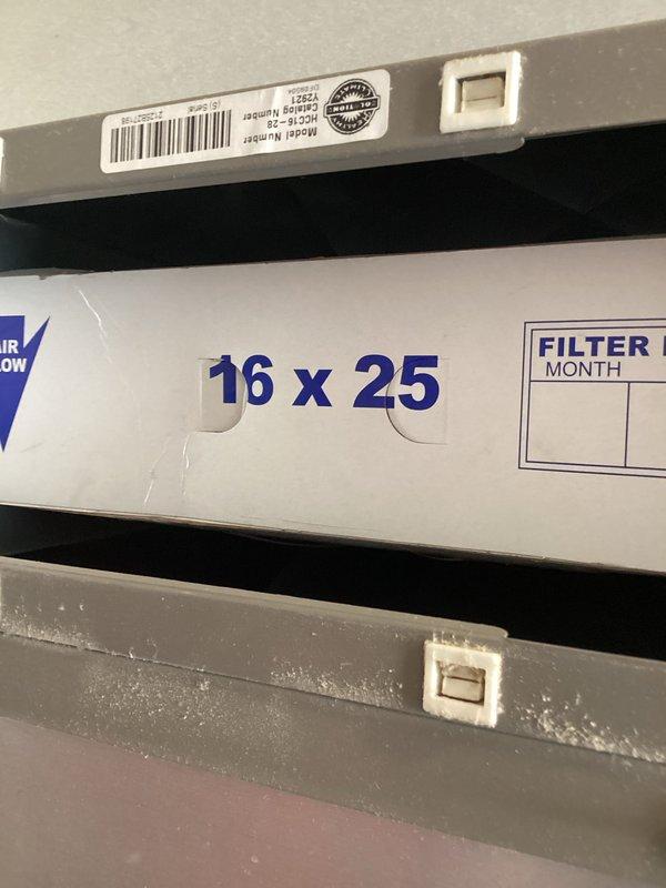 Completed first annual planned maintenance visit on recently installed HVAC system. Inspected electronic control board assembly, verified proper operation with illuminated status LED and secure wire connections at terminal blocks. Installed new 16x25x5 air filter in filter rack housing with proper mounting and documentation of installation date.