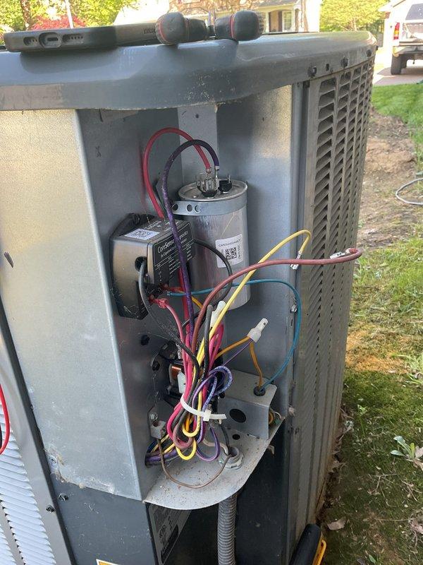 Completed first annual Gold Level planned maintenance on 5-year-old residential HVAC system with R-410A refrigerant. Performed comprehensive inspection of outdoor condensing unit electrical compartment, verifying proper operation of capacitor, contactor, and all electrical connections. Inspected Aspen refrigerant evaporator unit (Model CCMB347FR167) and confirmed all manufacturer specifications and safety labels intact. System operating within normal parameters with no issues identified.