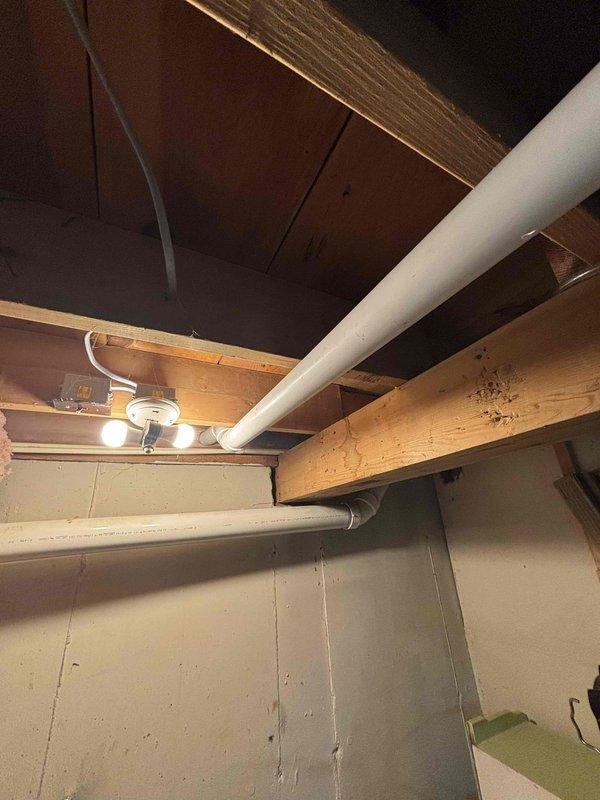 Completed full HVAC system installation in basement utility space. Installed new equipment with proper drainage integration utilizing existing PVC plumbing infrastructure and verified system ignition and startup. All electrical connections secured to ceiling joists per code requirements, and unit is operating within manufacturer specifications.