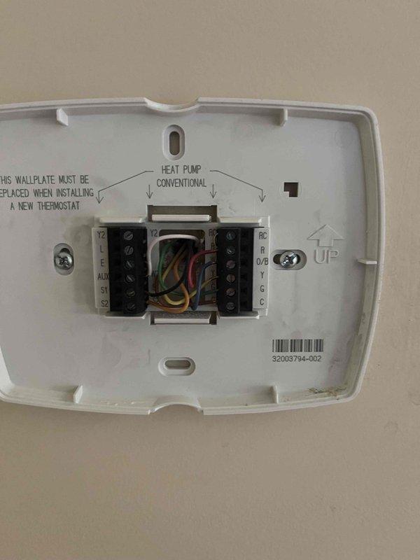 Conducted comprehensive HVAC replacement estimate for residential property. Evaluated existing system including Rheem furnace, heat pump configuration, associated ductwork, humidification equipment, and thermostat controls. Documented current equipment condition, noting flexible gas line connections, PVC venting system, refrigerant line routing, air filtration components, and multi-stage thermostat wiring with heat pump conventional setup. Photographed mechanical room installation and thermostat terminal connections to provide accurate assessment for complete system replacement recommendations.