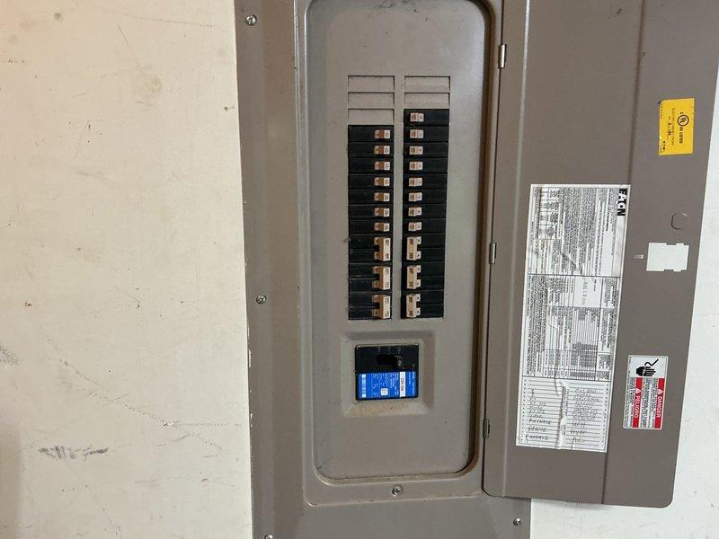 Completed comprehensive HVAC replacement estimate for residential property, evaluating existing Lennox furnace/air handler system installed in confined utility space alongside water heater. Assessed electrical panel capacity and circuit breaker configuration to determine compatibility with proposed replacement equipment and verified adequate power supply for new system installation.