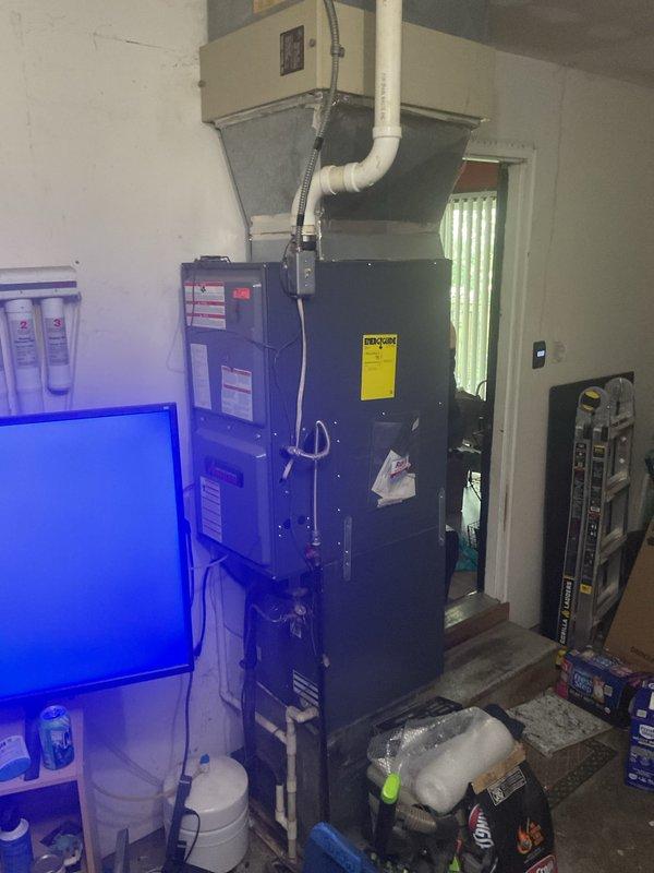 Responded to fire-damaged outdoor AC unit that was no longer operational. Conducted thorough assessment of existing downflow HVAC system configuration, documented equipment specifications and measurements, and photographed current installation including indoor air handler, ductwork connections, and accessory components. Prepared and confirmed comprehensive replacement estimate for cooling system restoration.