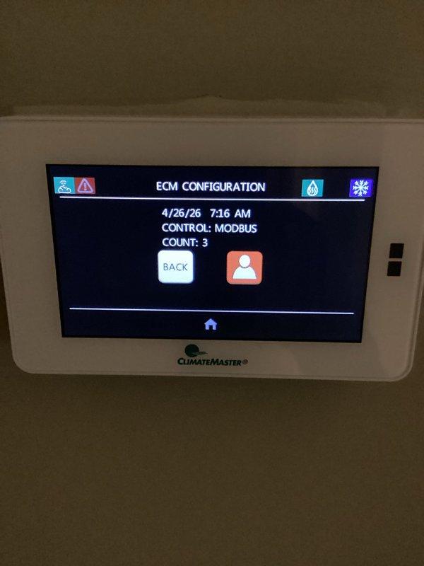 Responded to callback for recently installed ClimateMaster geothermal system displaying Code 20 error "ECM Configuration - Incorrect Unit Configuration/Incorrect Blower Motor" on thermostat. Accessed ECM configuration menu showing Modbus control with count of 3. Corrected blower motor parameters and unit configuration settings in thermostat programming to match installed equipment specifications. Cleared error code, verified system operation, and confirmed proper communication between thermostat and air handler. System restored to normal heating and cooling functionality.