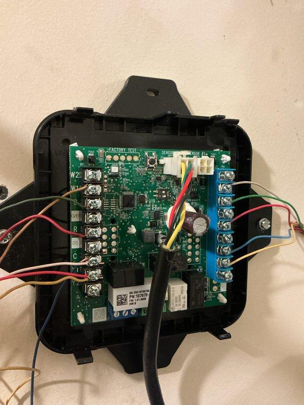 Completed annual Platinum Level maintenance on a single HVAC system. Performed comprehensive inspection of control board and electrical components, verifying proper wire connections at terminal blocks and testing all safety circuits. Inspected transformer, capacitor, and circuit board assembly for proper operation. Documented system condition through photos of control module and internal wiring. Collected filter measurements for future service. System operating within normal parameters with all components functioning correctly.