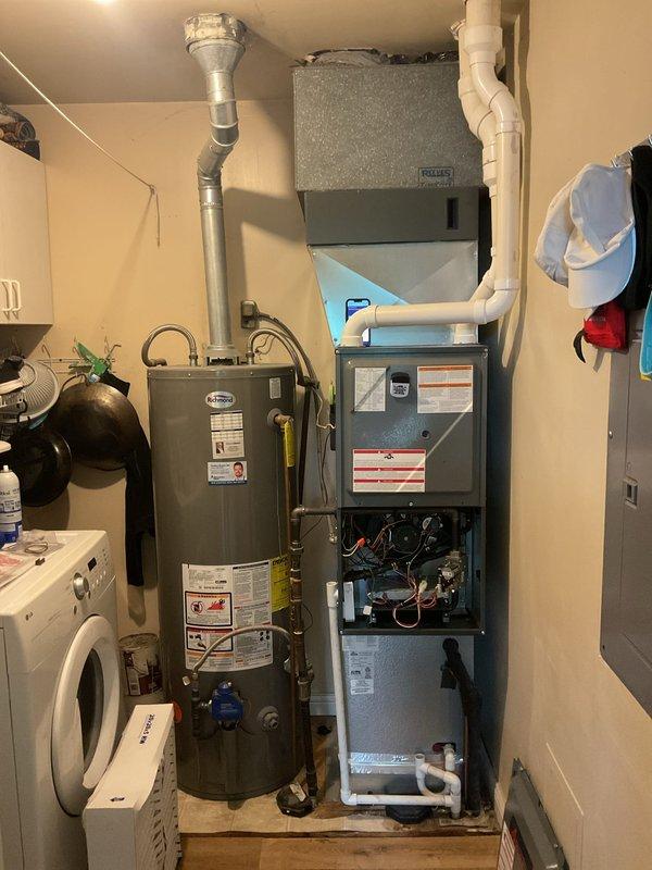 Completed Platinum Maintenance service on 2-year-old HVAC system during second scheduled visit. Performed comprehensive inspection of furnace unit and air handler, accessed internal components including control board, blower assembly, and gas valve to verify proper operation and connections. Installed new 20x20x5 filter and documented system condition with photos for maintenance records.