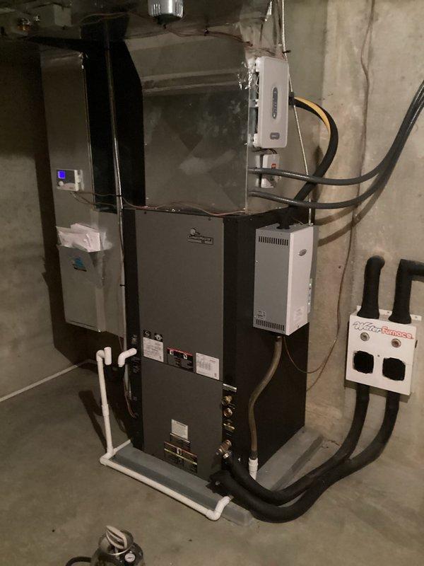 Completed second annual Gold Level planned maintenance visit for multi-system property with three HVAC units ranging from 1 to 6 years old. Performed comprehensive inspection and servicing of air handler unit in mechanical room, including filter replacement with 27.7x27.7x1 media filter and two 24x24x1 polarized filters. Verified proper operation of all electrical components, refrigerant lines, condensate drainage system, and ductwork connections; all systems found operating within manufacturer specifications with no deficiencies noted.