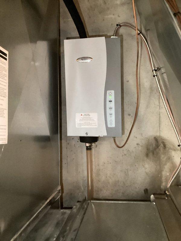 Completed second annual Gold Level planned maintenance visit for multi-system property with three HVAC units ranging from 1 to 6 years old. Performed comprehensive inspection and servicing of air handler unit in mechanical room, including filter replacement with 27.7x27.7x1 media filter and two 24x24x1 polarized filters. Verified proper operation of all electrical components, refrigerant lines, condensate drainage system, and ductwork connections; all systems found operating within manufacturer specifications with no deficiencies noted.