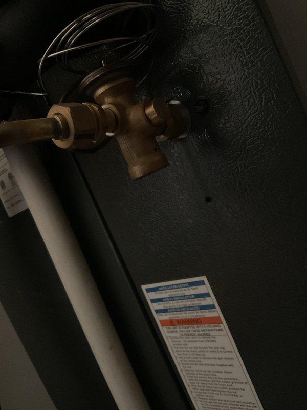 Completed annual second visit Platinum Level maintenance on 5-year-old HVAC system. Inspected evaporator coil and TXV valve assembly with copper line connections, documenting condition with photos showing brass service ports and equipment labels in mechanical space. Replaced 16x20x5 air filter and performed comprehensive system checks per Platinum maintenance protocol. Identified need for evaporator coil and TXV replacement, estimated 4-hour repair timeframe for future service. All maintenance items completed successfully, system operating within normal parameters at time of service completion.