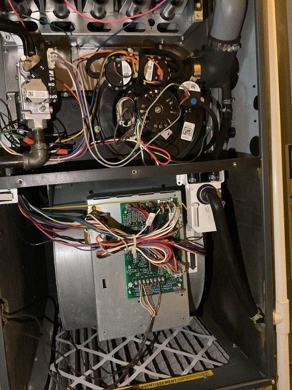 Completed comprehensive planned maintenance on residential HVAC system including both furnace and air conditioning components. Performed thorough inspection of furnace internal components including heat exchanger, blower motor assembly, and gas valve connections. Verified all electrical connections and wire harnesses for proper termination and condition. Inspected control board and associated wiring for signs of wear or damage. Replaced air filter at furnace unit.

Proceeded to outdoor condensing unit for AC tune-up service. Inspected electrical control panel and components including TITAN PRO capacitor for proper operation and specifications. Examined CoreSense diagnostic system and verified functionality. Checked all electrical connections, terminals, and wire routing within control panel. Both systems currently operating within normal parameters with no immediate concerns identified. All components inspected and found to be in satisfactory working condition at time of service.
