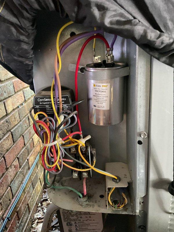 Completed comprehensive planned maintenance on residential HVAC system including both furnace and air conditioning components. Performed thorough inspection of furnace internal components including heat exchanger, blower motor assembly, and gas valve connections. Verified all electrical connections and wire harnesses for proper termination and condition. Inspected control board and associated wiring for signs of wear or damage. Replaced air filter at furnace unit.

Proceeded to outdoor condensing unit for AC tune-up service. Inspected electrical control panel and components including TITAN PRO capacitor for proper operation and specifications. Examined CoreSense diagnostic system and verified functionality. Checked all electrical connections, terminals, and wire routing within control panel. Both systems currently operating within normal parameters with no immediate concerns identified. All components inspected and found to be in satisfactory working condition at time of service.