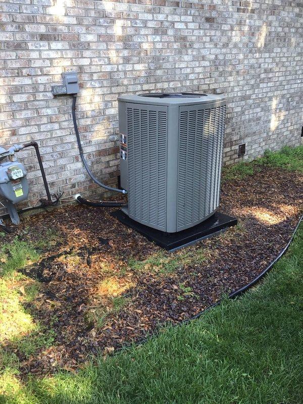 Completed first annual planned maintenance visit on Gold Level single-system home with 1-year-old HVAC equipment. Performed comprehensive system inspection of indoor and outdoor units, verified thermostat operation showing 68°F inside temperature with 61% humidity and proper cooling setpoint of 72°F, checked outdoor condenser unit positioned on pad with clear airflow through louvers, confirmed electrical connections and disconnect box functionality, and installed 20x25x5 filter. All components operating within normal parameters with no issues identified.