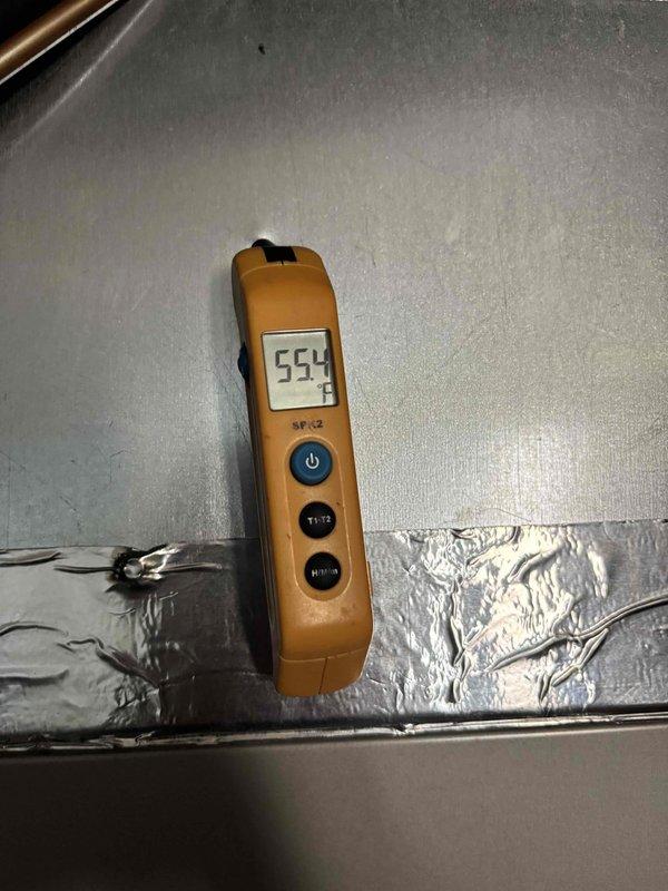 Completed annual planned maintenance on dual HVAC systems (7 years old) for Gold Level service agreement (2nd renewal). Identified refrigeration lines rubbing against exterior water spigot and documented need for 15-17 feet of armor flex insulation and mounting screws to properly secure lines to building structure. Recorded temperature readings and inspected exterior refrigerant line routing along brick wall foundation area.