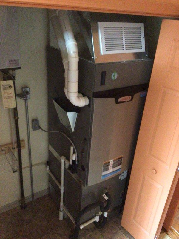 # HVAC Maintenance Summary

Completed annual planned maintenance on a 1-year-old Lennox residential HVAC system. Performed comprehensive inspection of outdoor condenser unit and indoor air handler, replaced 20x25x4 air filter, verified proper system operation, and documented equipment condition with photos.

# Detailed Work Performed

Conducted thorough annual maintenance service on residential heating and cooling system as part of planned maintenance agreement. This represented the first scheduled maintenance visit for the 1-year-old equipment.

**Outdoor Unit Inspection:**
Inspected Lennox brand condenser unit positioned on anti-vibration pad against exterior brick wall. Verified unit levelness and pad condition. Examined cabinet exterior for damage, corrosion, or deterioration. Checked louver-style ventilation grilles for obstructions and proper airflow clearance. Inspected fan guard and top grille cover for security and damage. Verified electrical conduit and refrigerant line set c