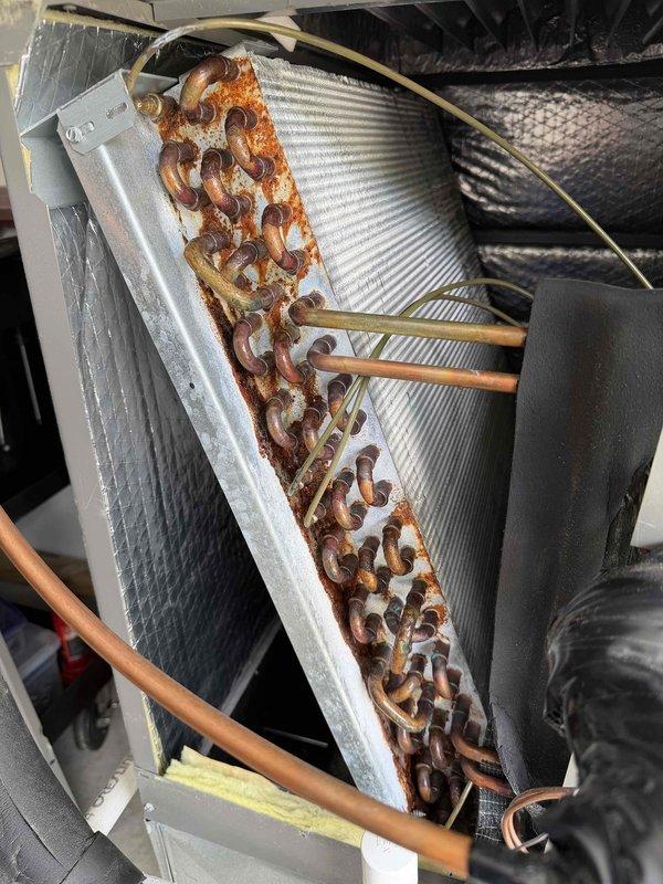 Performed annual Platinum Level maintenance on 3-year-old HVAC system. Replaced 20x25x2 polarized air filter and completed comprehensive system inspection. During inspection, discovered extensive rust and corrosion on evaporator coil assembly, with significant oxidation damage across the coil fins. Documented coil condition with photographs showing deteriorated metallic surfaces and corrosion patterns. Verified all refrigerant lines, copper piping, condensate drain system, and electrical connections. Unit remains under warranty coverage. Submitted part order request for replacement evaporator coil with model and serial number documentation, manufacturer information, and photographic evidence to expedite warranty processing. Follow-up visit scheduled for coil replacement upon part arrival, estimated as half-day repair. System operational but requires evaporator coil replacement to prevent further deterioration and maintain efficiency.