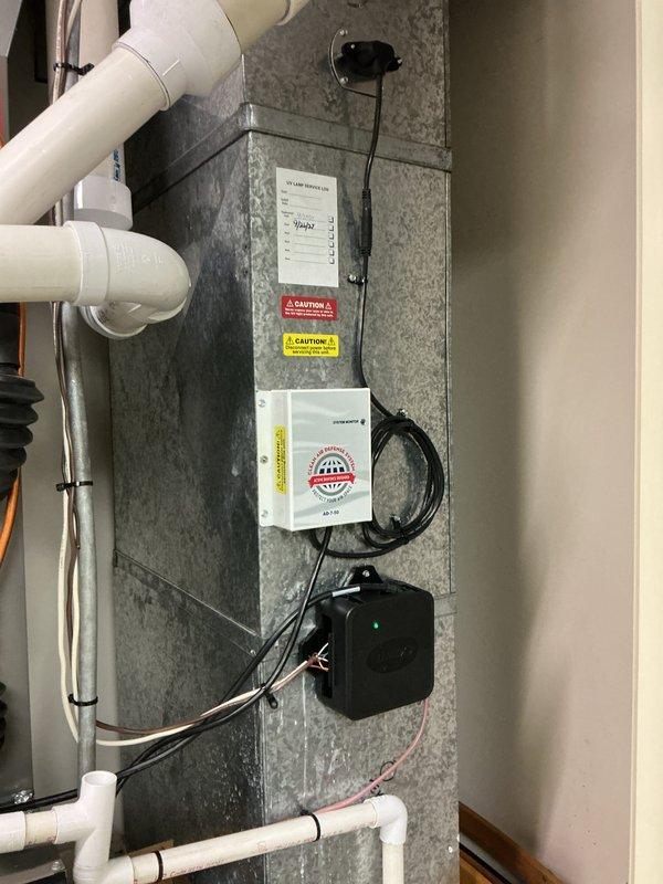 # HVAC Maintenance Summary

Completed annual Platinum Level maintenance on a single residential HVAC system installed in February 2026. Performed comprehensive inspection of all mechanical components, condensate drain lines, and ductwork. Verified proper operation of control modules, sensors, and electrical connections. Collected filter size measurements for future service requirements. Documented system condition through photographic records showing PVC condensate piping configuration, control box wiring, and overall equipment installation. All components found operating within normal parameters with no immediate service needs identified.