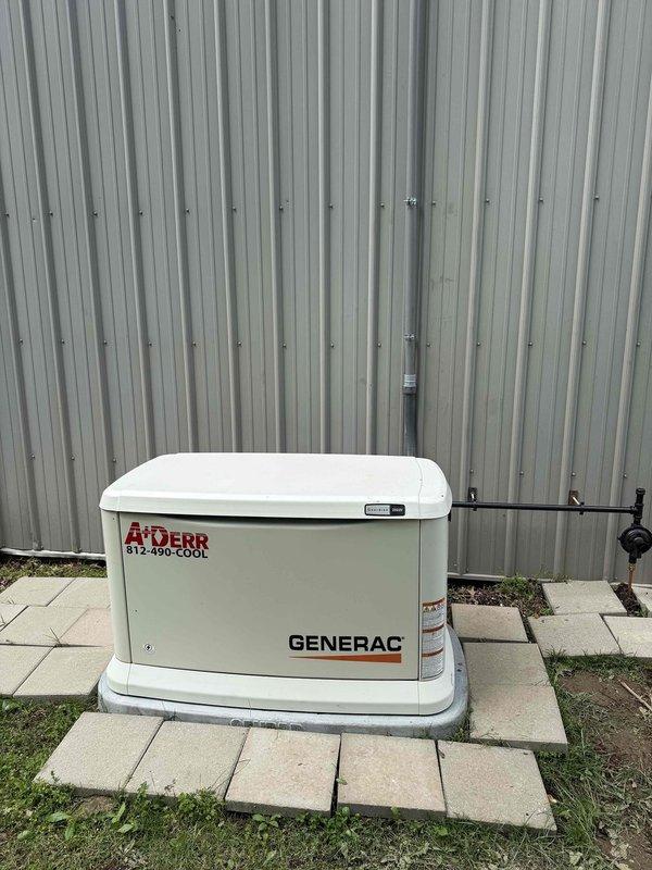 Completed follow-up site visit for Generac automatic transfer switch installation connected to Duke Power service. Documented existing electrical configuration including main service panel, utility meter, transfer switch with emergency power disconnect, and standby generator unit mounted on concrete pad. Verified proper installation of conduit runs, PVC piping, junction boxes, and all associated electrical components between the transfer switch enclosure and generator. Photographed complete system setup showing transfer switch with Generac branding, emergency disconnect labeling, generator unit positioning, and all interconnecting wiring and conduit pathways for service records.