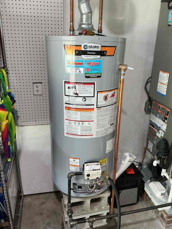 Performed comprehensive maintenance flush on State ProLine commercial-grade tanked water heater. Drained sediment buildup from tank bottom through drain valve, flushed system with fresh water to remove mineral deposits and debris, and inspected all connections including copper supply lines, pressure relief valve, and gas control assembly. Verified proper operation of temperature and pressure relief valve, checked all plumbing connections for leaks, and confirmed unit returned to normal operating parameters upon completion.