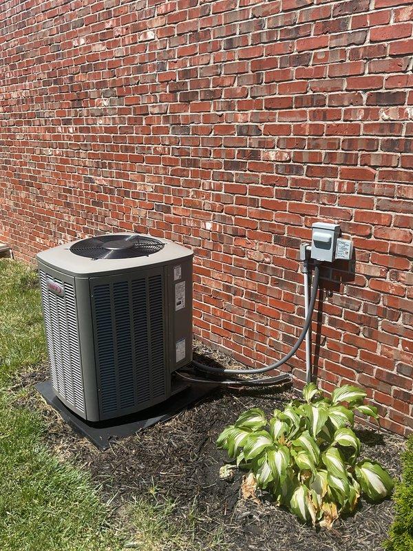 # HVAC Maintenance Report

Completed second annual planned maintenance visit on a 2-year-old residential HVAC system as part of Gold Level service agreement. Performed comprehensive inspection and servicing of both outdoor condensing unit and indoor air handler/furnace system.

## Outdoor Unit Service

Inspected outdoor condensing unit positioned on pad against exterior brick wall. Verified proper clearances and airflow around equipment. Checked electrical disconnect box and conduit connections for security and proper operation. Examined refrigerant lines for wear, damage, or leaks. Cleaned condenser coils and removed debris from unit exterior and surrounding area. Verified fan motor operation and inspected fan blades for damage. Measured electrical amperage and voltage at unit. Confirmed proper operation of contactor and capacitor.

## Indoor Unit Service

Serviced vertical furnace and air handler system located in interior closet space. Replaced 16x20x4 air filter with new filter to 