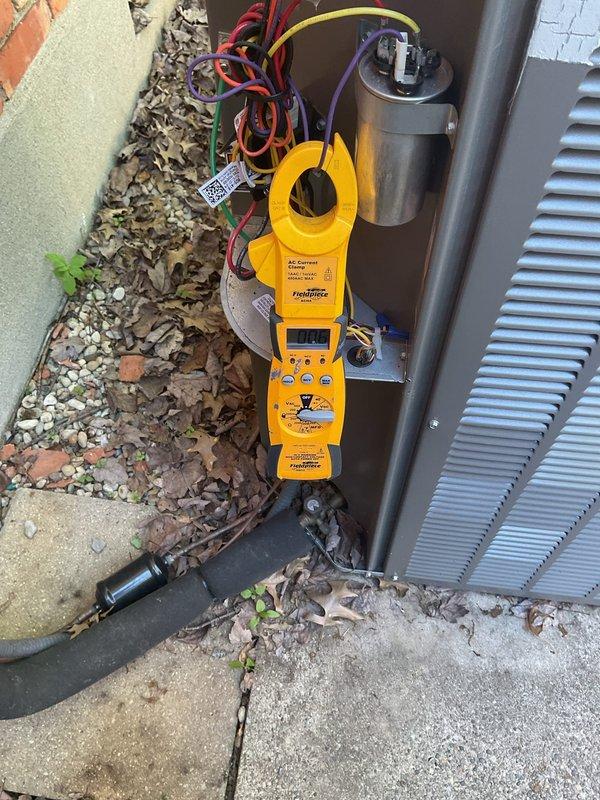 # HVAC Maintenance Summary

Completed planned maintenance on residential air conditioning system. Performed comprehensive system diagnostics using digital multimeter to verify electrical components and capacitor functionality. Inspected outdoor condenser unit, including fan operation, refrigerant lines, and electrical connections. All components operating within manufacturer specifications. System running efficiently with no issues identified.

# Detailed Work Performed

Arrived on site to perform scheduled maintenance on a one-year-old residential HVAC system requiring 16x25x5 filter media. This marked the second service visit for this equipment.

**Outdoor Condenser Unit Inspection:**
Conducted thorough visual inspection of the outdoor condensing unit positioned on concrete pad adjacent to building. Verified unit clearances and assessed surrounding area for proper drainage and airflow. Noted accumulation of leaves and debris in mulched area around unit base.

**Electrical System Diag