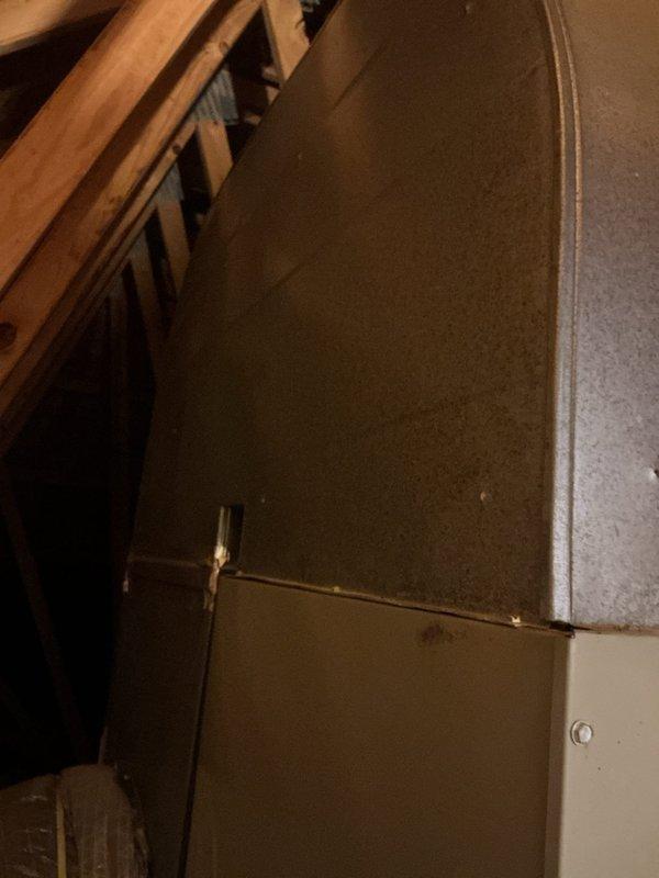 Completed comprehensive assessment of existing HVAC system located in attic space for equipment replacement estimate. Documented current furnace/air handler unit, flexible ductwork configuration, and aging metal supply ducts showing dust accumulation and wear. Provided detailed replacement recommendations and energy-efficient upgrade options to improve system performance and indoor air quality.
