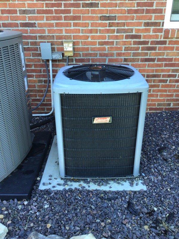 Completed annual maintenance inspection on two-system residential HVAC installation as part of planned maintenance agreement. Performed comprehensive evaluation of 12-year-old Coleman outdoor condensing unit and 1-year-old furnace system. Conducted thorough inspection of both systems including electrical connections, refrigerant levels, airflow measurements, and component operation. Assessed overall system efficiency in response to concerns regarding elevated utility costs. Verified proper operation of all safety controls, checked condenser coil condition, inspected ductwork and PVC drainage systems, and confirmed furnace heat exchanger integrity. Documented equipment conditions with photographic records showing outdoor unit installation on concrete pad with proper clearances and indoor furnace installation with associated water treatment equipment. All systems found operational with recommendations provided for optimizing energy efficiency.