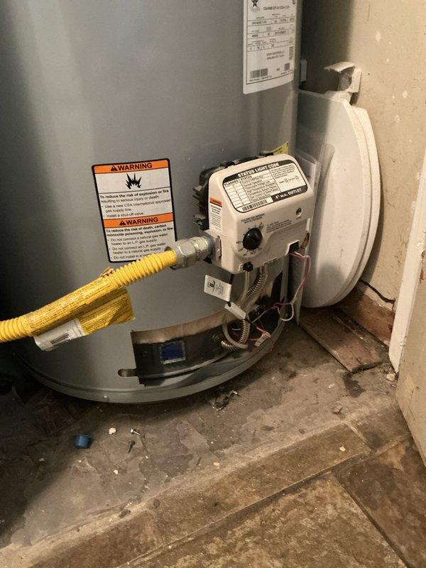 Performed routine maintenance flush on conventional tanked water heater as part of preventative maintenance campaign. Drained sediment buildup from tank bottom to improve heating efficiency and extend equipment lifespan. Inspected gas control valve, flexible gas connector, and safety labels for proper operation and compliance. Verified proper installation of drip pan and documented equipment condition through photographic records. Presented Bronze maintenance plan renewal option to customer for ongoing system protection.