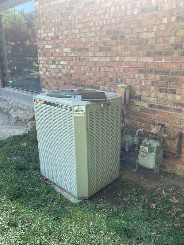Conducted comprehensive replacement estimate for aging R22 HVAC system with active refrigerant leak. Evaluated existing Trane XE 80 furnace and outdoor heat pump unit for complete system replacement, including air handler upgrade. Assessed ductwork conditions and identified rusted plenum requiring replacement. Discussed proper equipment sizing calculations for residential application and evaluated feasibility of adding additional supply vent to accommodate kitchen remodeling project.