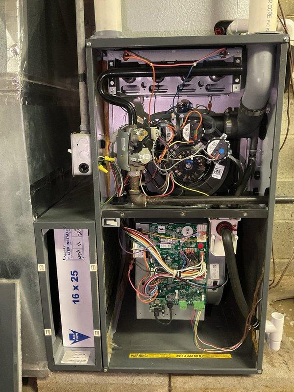 Completed Platinum Level annual maintenance on a 5-year-old HVAC system during the first scheduled visit. Performed comprehensive inspection of furnace components including burner assembly, heat exchanger, blower motor, and dual control boards with all electrical connections verified as secure. Replaced 16x25x5 air filter and documented system operation with photographic records of unit nameplate data and internal components showing proper configuration and functionality.