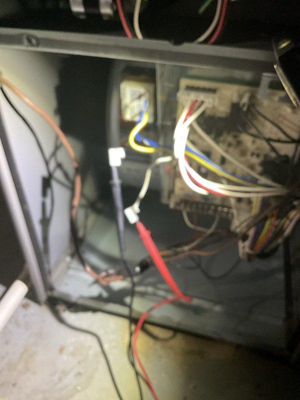 Responded to no cooling call on 3-year-old residential HVAC system. Upon arrival, confirmed system was completely non-operational with no power to unit. Performed diagnostic inspection of air handler and control systems. Examined electrical connections, control board, and low-voltage wiring within the air handler compartment. Identified faulty wiring connections and loose terminals affecting system operation. Secured all electrical connections, tested control voltage, and verified proper power supply to components. Cycled system through startup sequence and confirmed unit returned to normal operation with proper airflow and cooling output.
