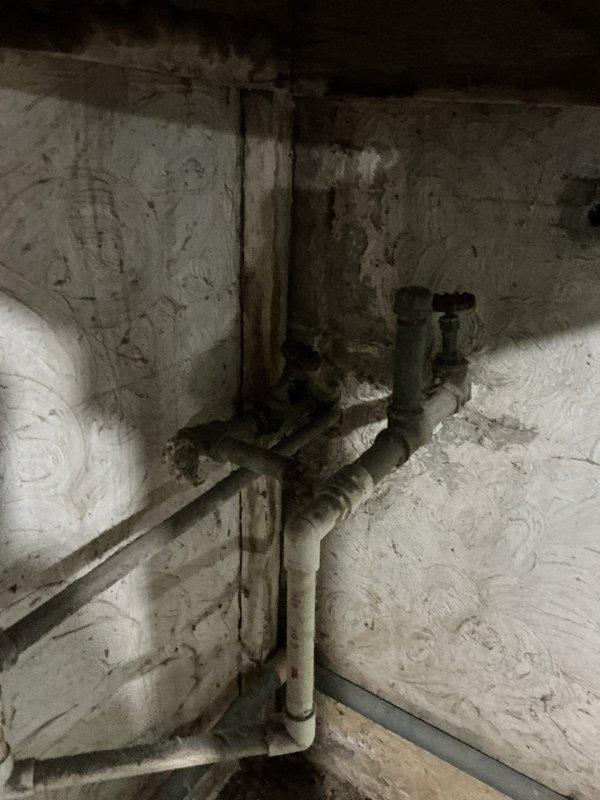 Performed routine maintenance flush on Whirlpool tanked water heater previously installed in basement utility area. Drained sediment buildup from tank bottom through drain valve, inspected temperature and pressure relief valve discharge piping, and verified all connections and access panels were properly secured. Unit returned to normal operation with improved efficiency.
