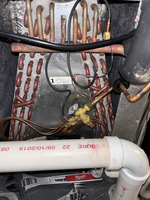 Replaced faulty thermostatic expansion valve (TXV) on HVAC system. Verified proper refrigerant pressures and system operation using digital manifold gauges, confirming unit returned to normal cooling performance.