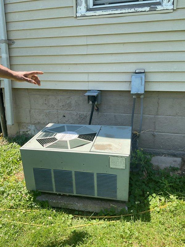 Conducted comprehensive replacement estimate for non-functional HVAC system that had lost all refrigerant charge due to leak and utilizes obsolete refrigerant no longer available for service. Evaluated existing outdoor condensing unit showing visible corrosion and weathering on cabinet panels, assessed indoor ductwork and air handler components in basement mechanical space, and documented current system configuration. Provided complete replacement options to restore cooling capacity to residence.