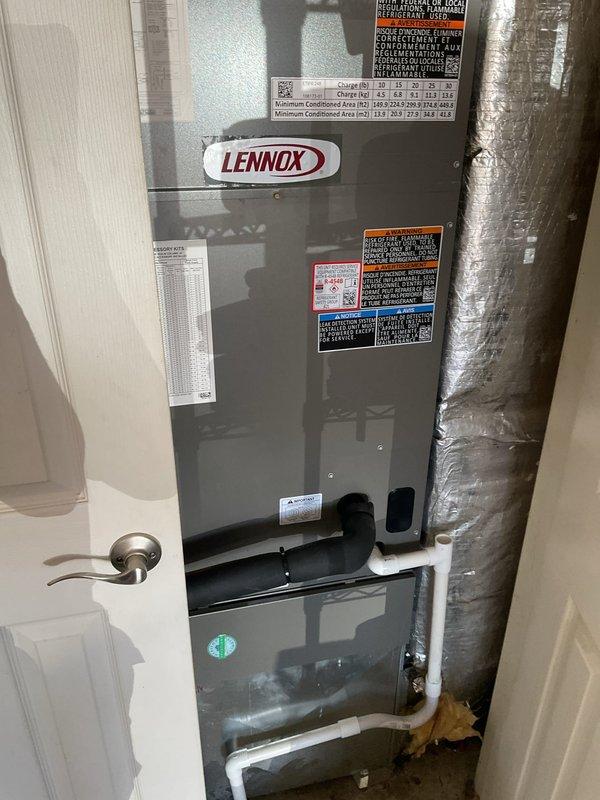 Completed annual Platinum Level maintenance on a single-zone HVAC system with a Lennox air handler unit. Performed comprehensive system inspection, filter replacement, and routine maintenance procedures on the one-year-old equipment. Documented system condition with photographs showing the air handler installation, insulated ductwork, and condensate drain line in the mechanical space.