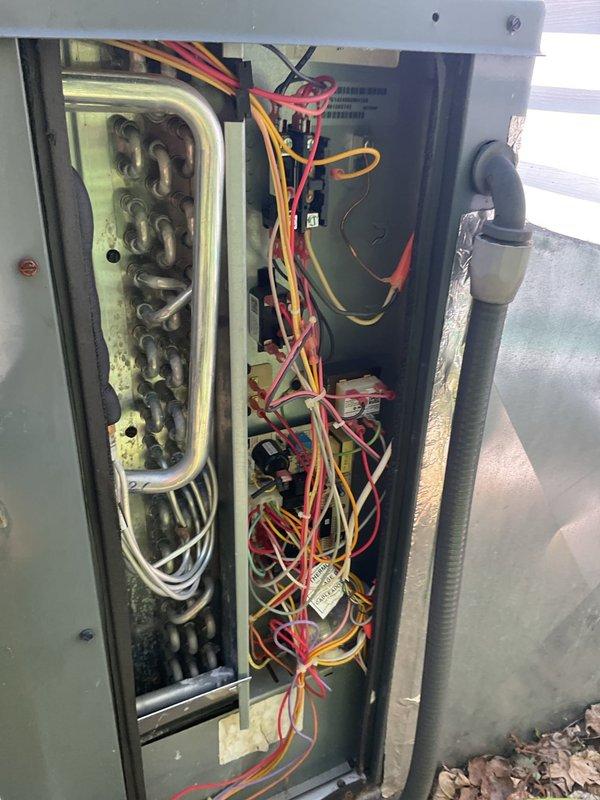 Completed scheduled Gold Level maintenance on 9-year-old single system. Inspected electrical control panel and outdoor condensing unit, noting weathered terminal connections and accumulated debris in compressor compartment. Replaced 16x25x5 air filter, verified system operation, and documented equipment condition with photos for service records.