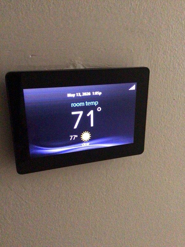 Completed planned maintenance visit on 11-year-old single system residential HVAC unit with SpaceGard 2200 air filtration system. Thermostat verified operational at 71°F room temperature. Inspection revealed significant dust and debris accumulation on air handler components and ductwork requiring attention during future service intervals.