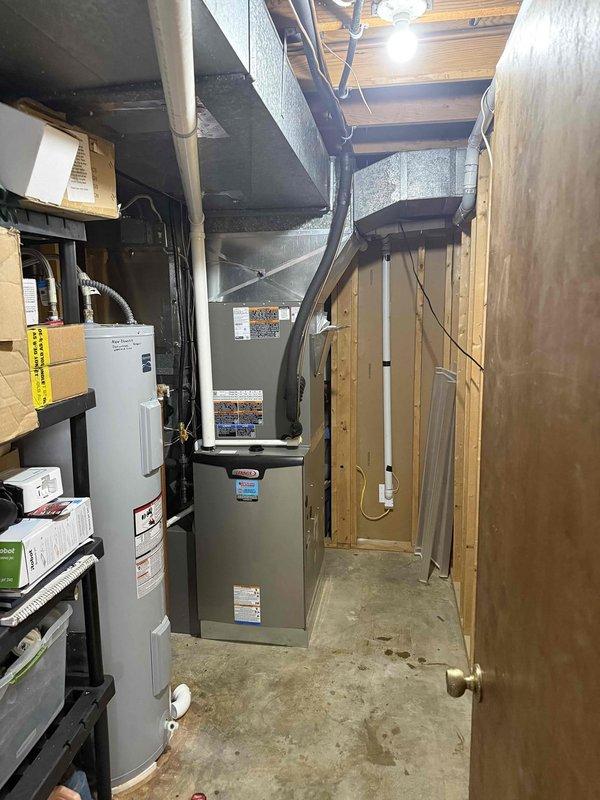 # HVAC Complete System Installation

Completed full residential HVAC system installation in basement utility area, including 4-ton 18 SEER air conditioning unit paired with 99% AFUE upflow gas furnace. Positioned new furnace and connected supply and return ductwork to existing infrastructure, ensuring proper airflow distribution throughout the home. Installed and configured new condensing unit with refrigerant lines, performing evacuation and charging procedures to manufacturer specifications. Utilized digital manifold gauge to verify system pressures, superheat, and subcooling values, confirming optimal refrigerant charge and system performance. Tested heating and cooling cycles, verified proper ignition sequence, and ensured all safety controls functioning correctly. System operational and ready for service.