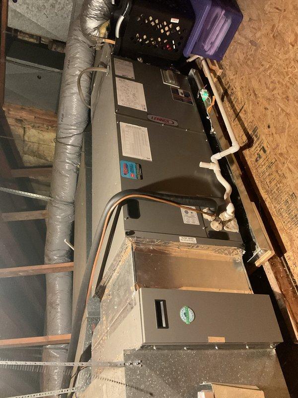 Completed Platinum Level maintenance on a 2-year-old Lennox air handler system during first preventative maintenance visit. Performed comprehensive inspection of unit including blower assembly, electrical connections, and drain pan, replaced 20x25x5 air filter, verified proper operation of humidifier unit, and documented system condition with interior and exterior photographs. All components found operating within normal parameters with no immediate service concerns noted.
