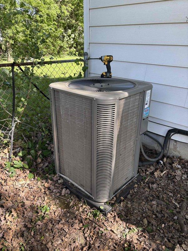 Completed Platinum Level monthly maintenance on residential HVAC system, which included inspection of outdoor condensing unit, verification of proper operating temperatures with digital thermometer showing 14.9°F temperature differential, and replacement of 16x25x5 air filter. All system components inspected and found operating within normal parameters, with unit secured and area left clean upon completion.