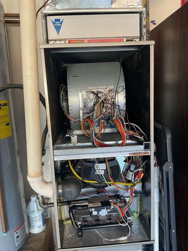 Completed Platinum Level maintenance on a 9-year-old AirRanger HVAC system during second service visit. Performed comprehensive inspection of indoor furnace unit and outdoor condensing unit, including examination of blower motor assembly, heat exchanger, burner components, electrical connections, and control boards. Verified proper operation of all system components, checked wiring harnesses and connections for integrity, and inspected capacitor and compressor in outdoor unit. Customer advised that system is approaching typical service life and may benefit from renewal consideration. Replaced 16x25x4 air filter per customer preference and documented system condition through photographic records.
