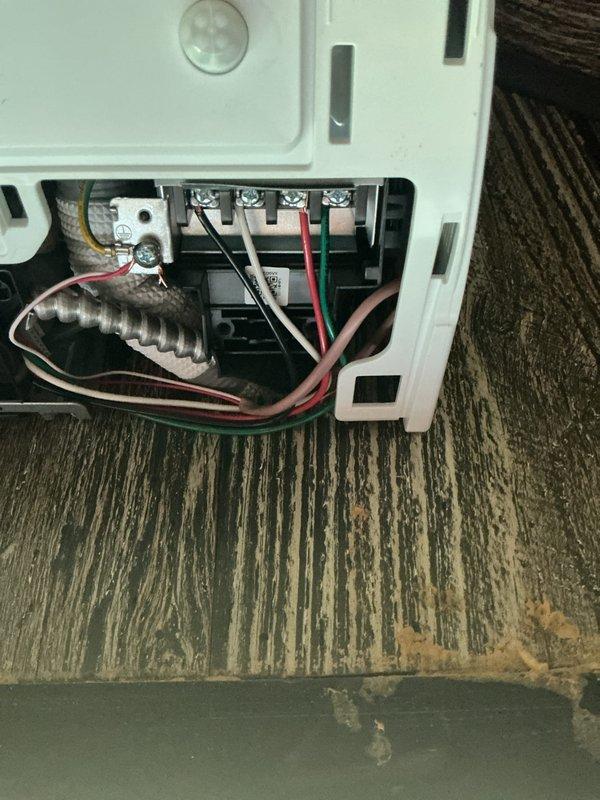 Completed first scheduled quarterly maintenance visit on HVAC system. Accessed unit using key from designated location, performed comprehensive filter inspection, and documented electrical terminal connections and wiring configurations with photos showing proper wire terminations and grounding connections in good condition.