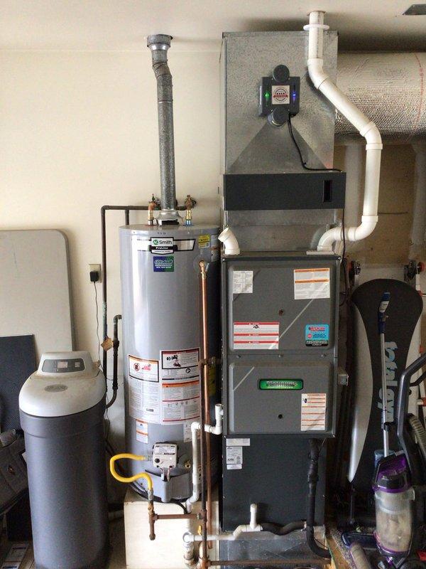 # HVAC System Maintenance Summary

Completed annual Platinum Level maintenance on a 2-year-old residential HVAC system during the second scheduled visit. Performed comprehensive inspection and servicing of both the outdoor Maintrimax condensing unit and indoor furnace system. Replaced 20x25x5 air filter as part of routine maintenance protocol. Conducted thorough system evaluation including inspection of electrical components, refrigerant lines, condensate drainage, and all mechanical assemblies. Verified proper operation of the furnace blower motor, heat exchanger, and safety controls. Inspected outdoor unit coil for debris accumulation, checked refrigerant pressures, and ensured adequate airflow through the condenser. Examined all visible ductwork connections and PVC condensate piping for proper installation and function. Documented system performance with photographic records showing equipment condition and installation quality. All components operating within manufacturer specificat