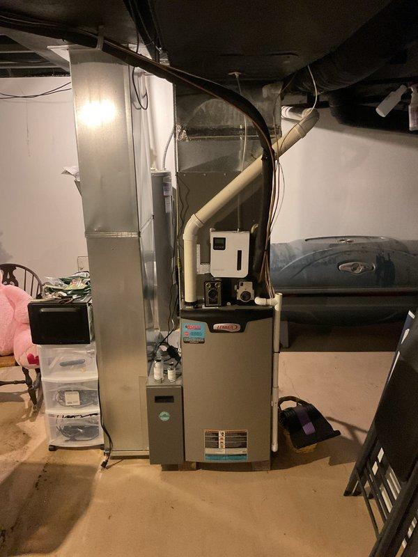Completed annual AC tune-up on a 1-year-old residential cooling system that was operating properly upon arrival. Performed routine preventive maintenance on both the outdoor condensing unit and indoor air handler, including inspection of refrigerant lines, electrical connections, and all major components. System tested and confirmed to be functioning within manufacturer specifications with no issues identified.