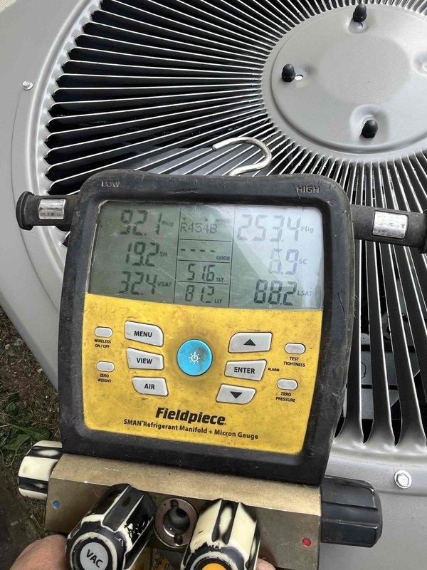 Completed installation of 2.5-ton Lennox air conditioning system with matching evaporator coil at residential property. Unit was positioned on concrete pad adjacent to structure with proper clearances maintained, electrical disconnect installed per code requirements, and refrigerant lines connected and charged to manufacturer specifications. System startup performed with diagnostic readings confirming proper operation at 92.1°F condensing temperature and 324 VAC supply voltage.